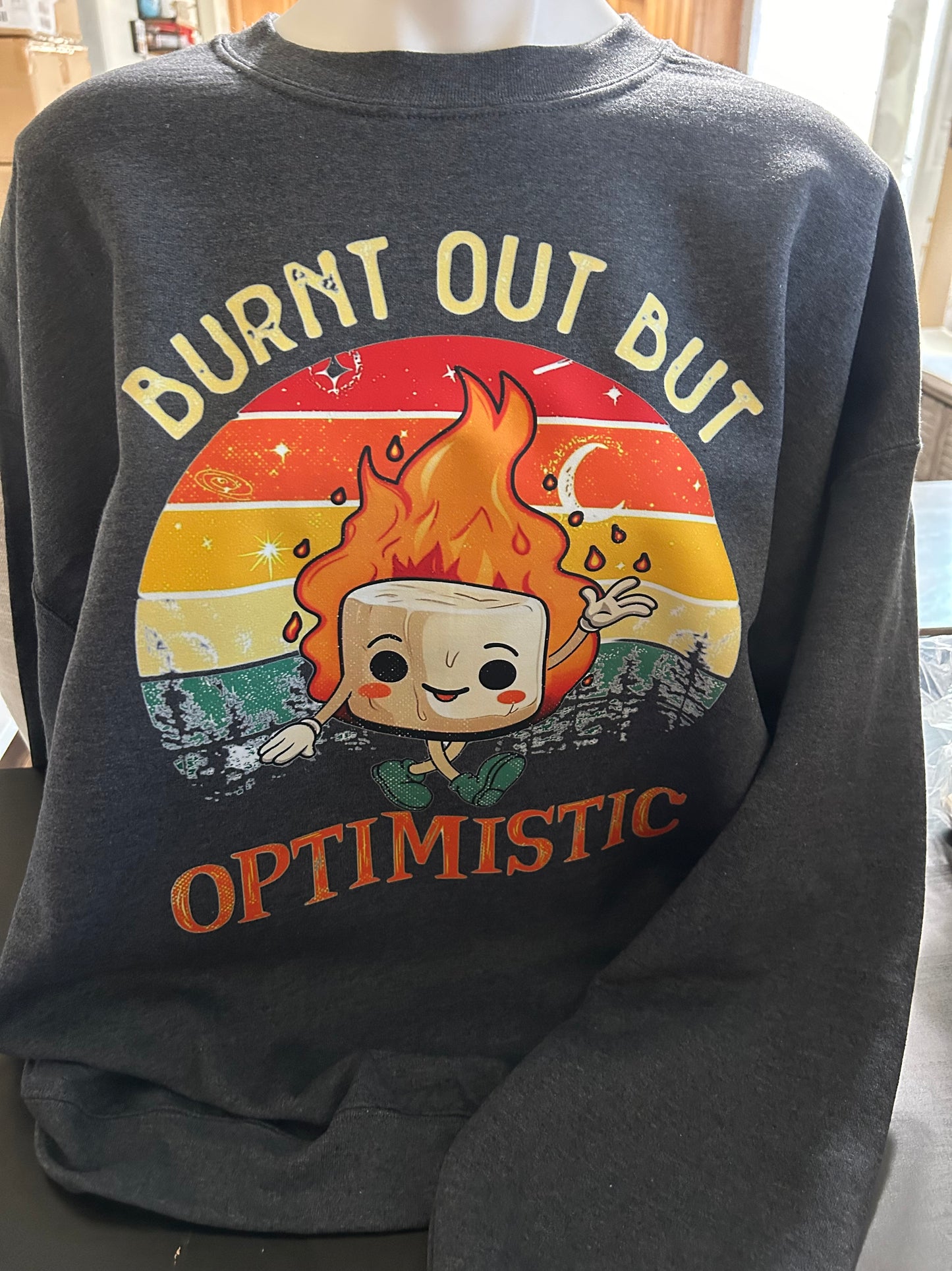 Optimistically Burnt Out: A Humorous Sweatshirt for Everyday Wear
